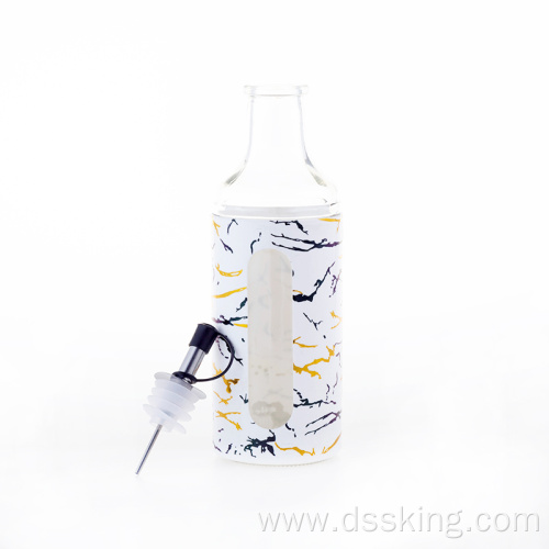 Glass oil bottle with plastic casing